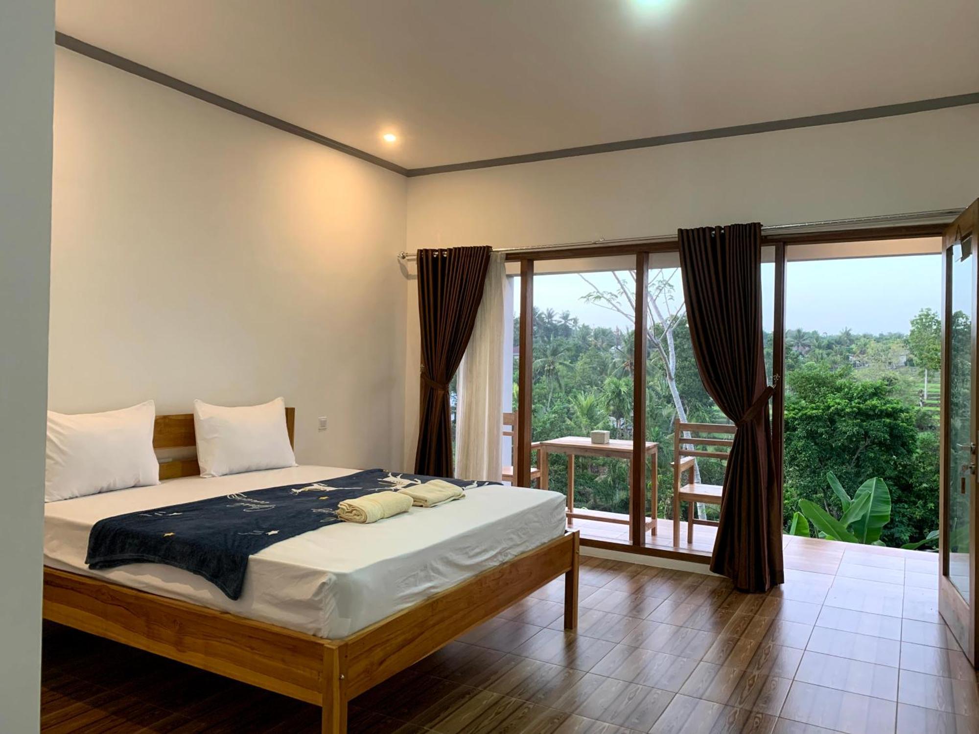 Tommy Homestay Plambi Номер фото