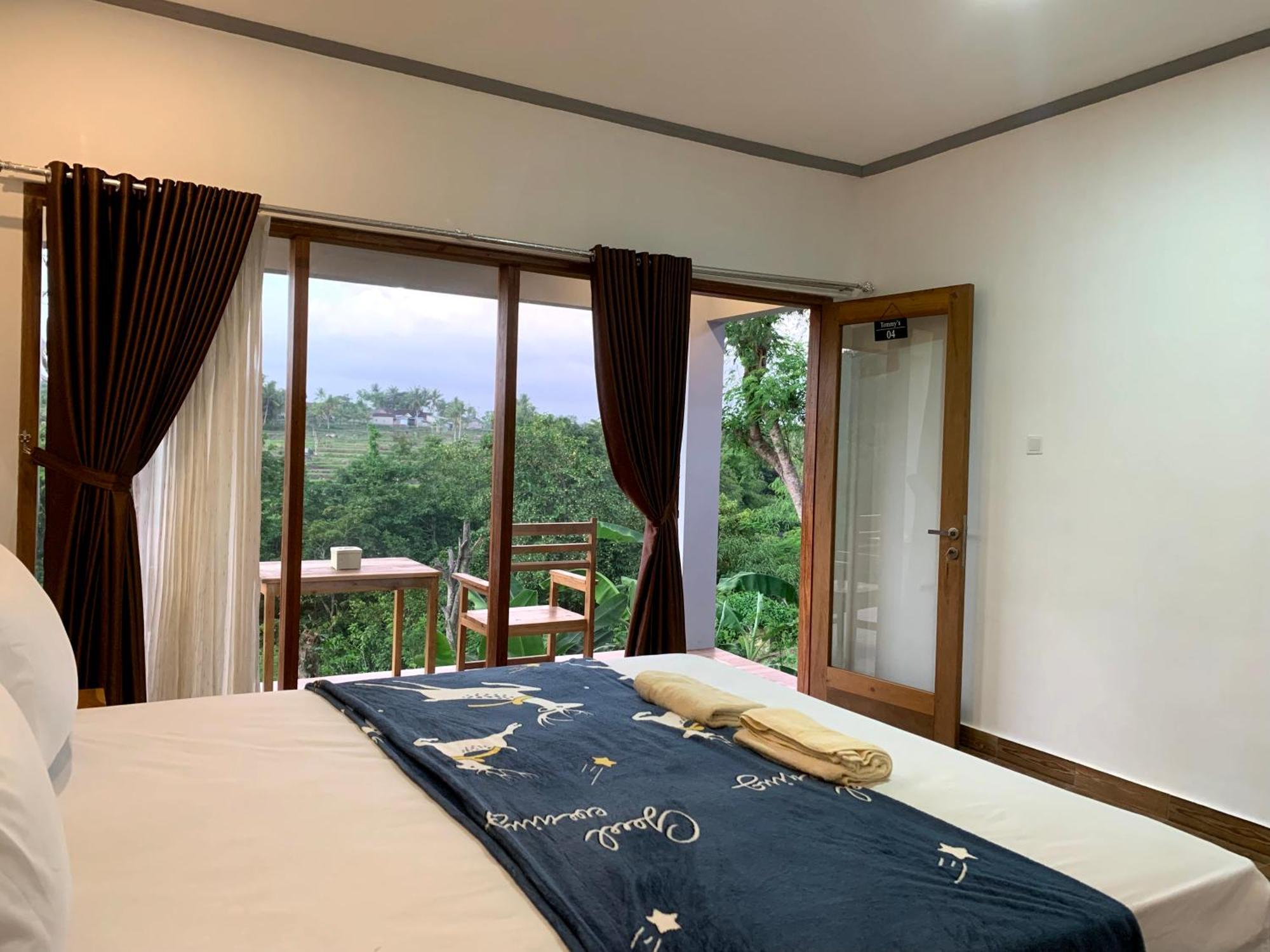 Tommy Homestay Plambi Номер фото